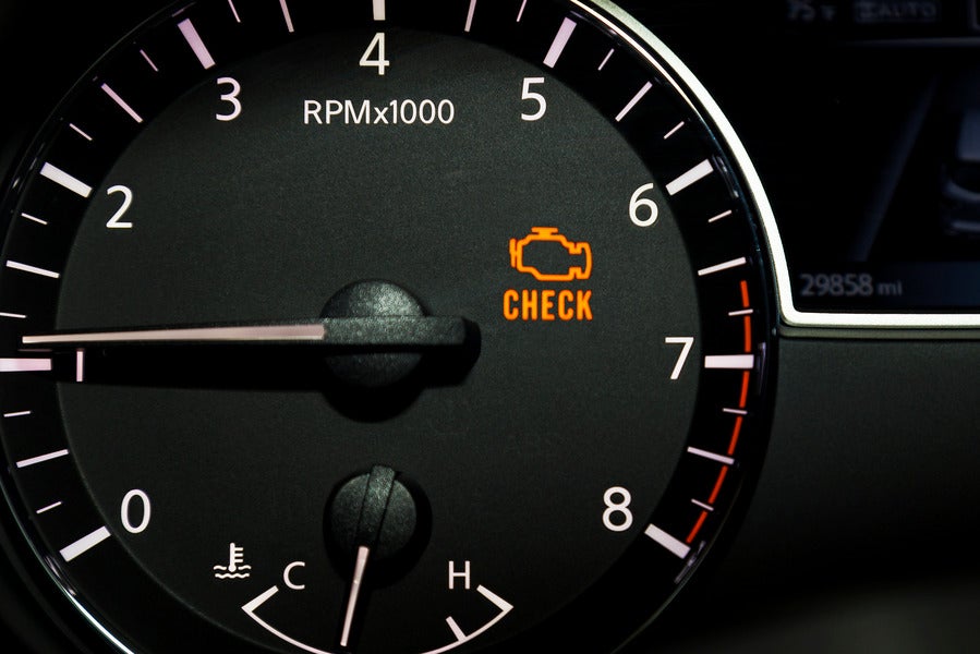 Check Engine Light on a car dashboard